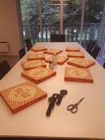 11 pizzas on a table